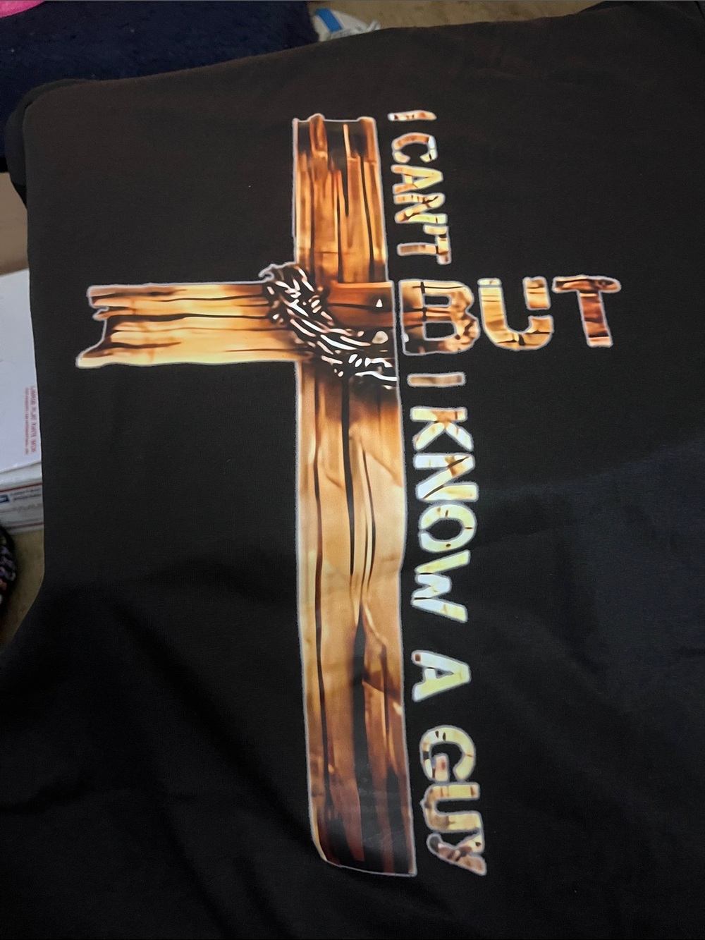 Graphic Cross Tee with 'I Can't But I Know A Guy' Slogan